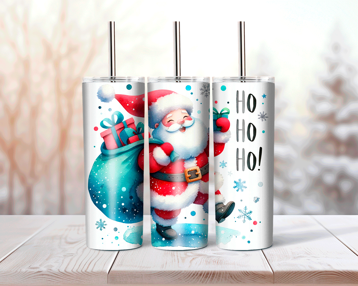 Three Christmas-themed tumblers with Santa Claus and gift designs on a wooden surface.