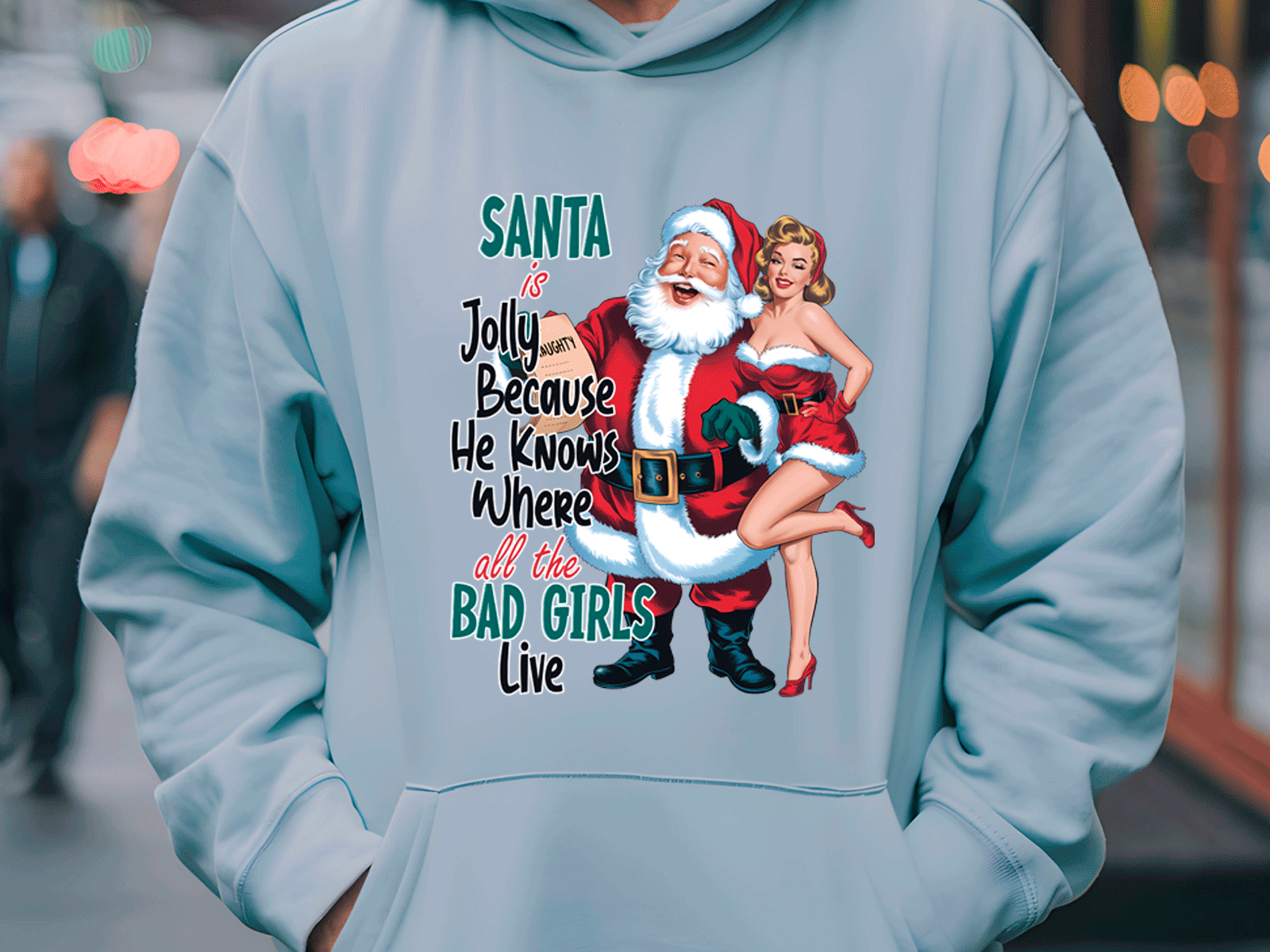 Light blue hoodie with Santa Claus graphic and text in an urban setting