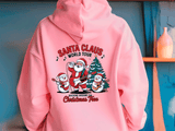 Pink hoodie with Santa Claus graphic and text on a blue background