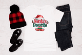 Holiday-themed outfit with beanie, shirt, jeans, and shoes on a white background