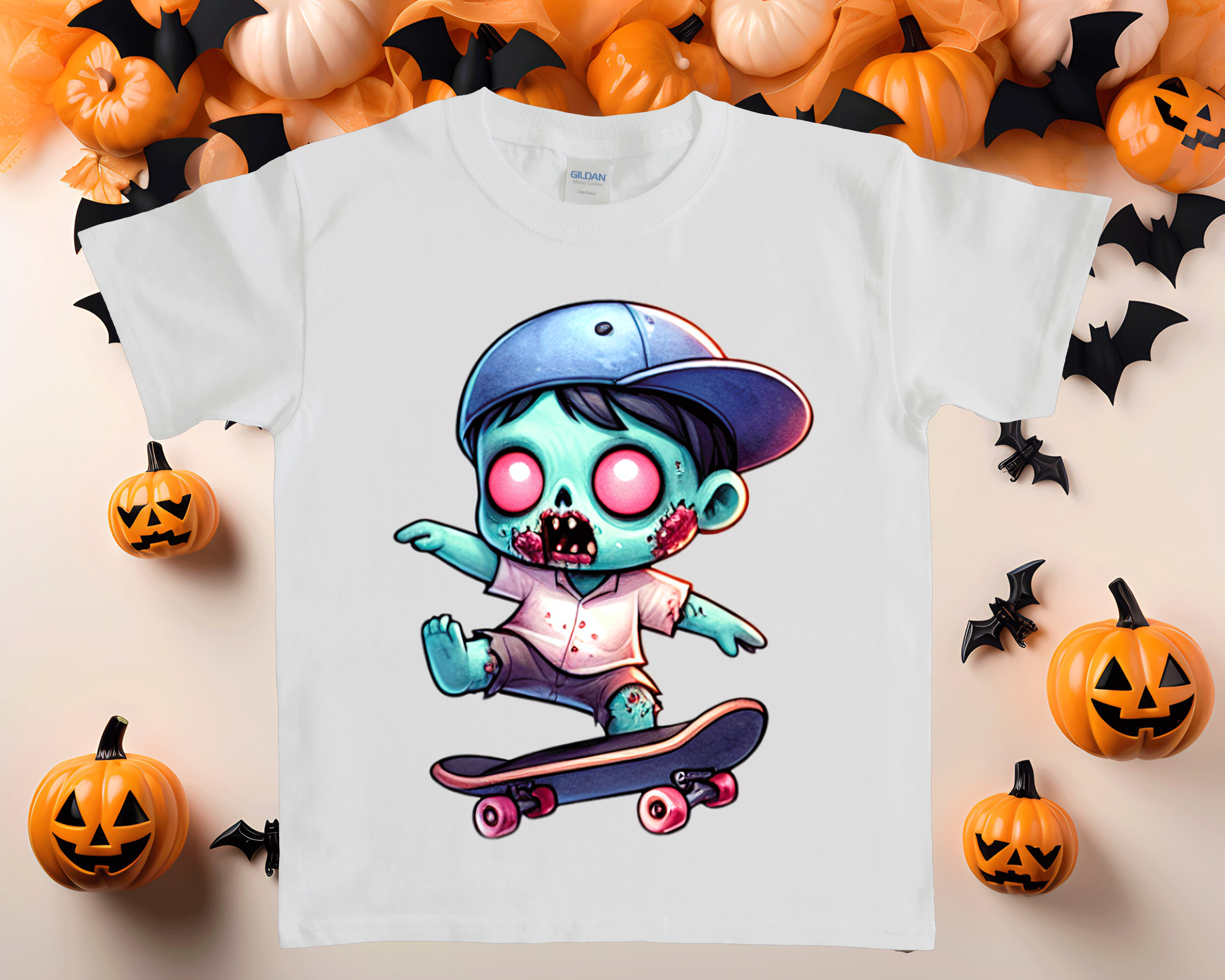 White t-shirt with a cartoon zombie on a skateboard design, surrounded by Halloween decorations.