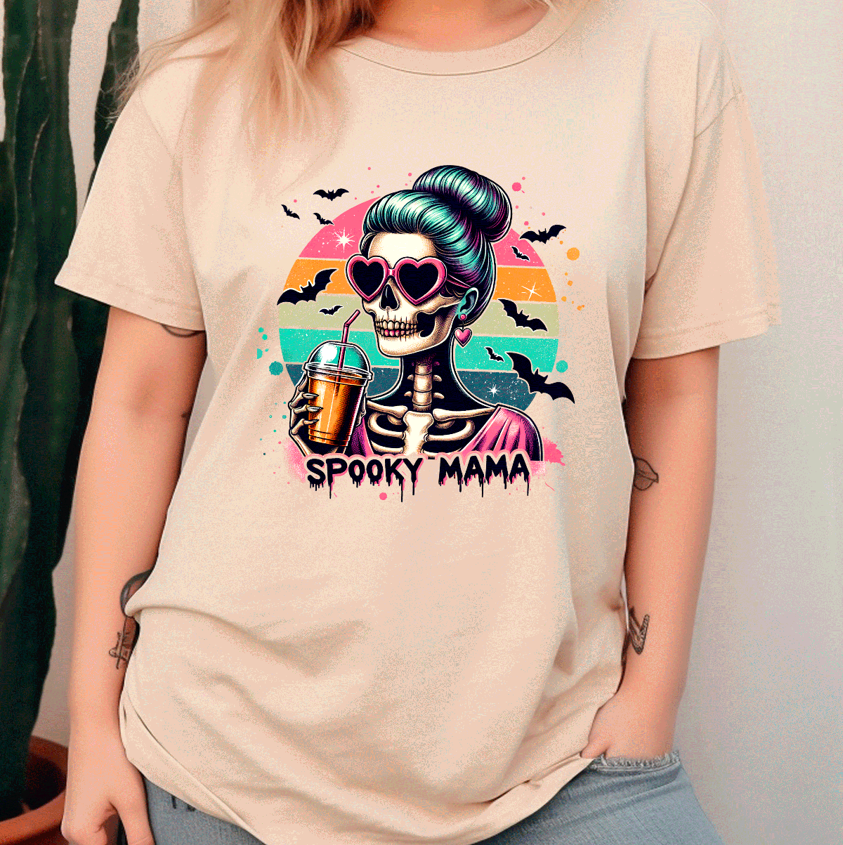 lady wearing t-shirt with Halloween themed graphic