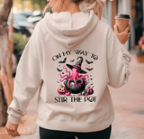 Person wearing a hoodie with a Halloween-themed design and text.