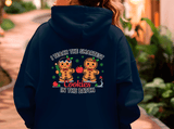 Navy blue hoodie with gingerbread cookies design on the back, featuring text 'I teach the smartest cookies in the batch'.