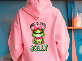 Pink hoodie with a green cat graphic and text 'This is my JOLLY' on a blue wall background.