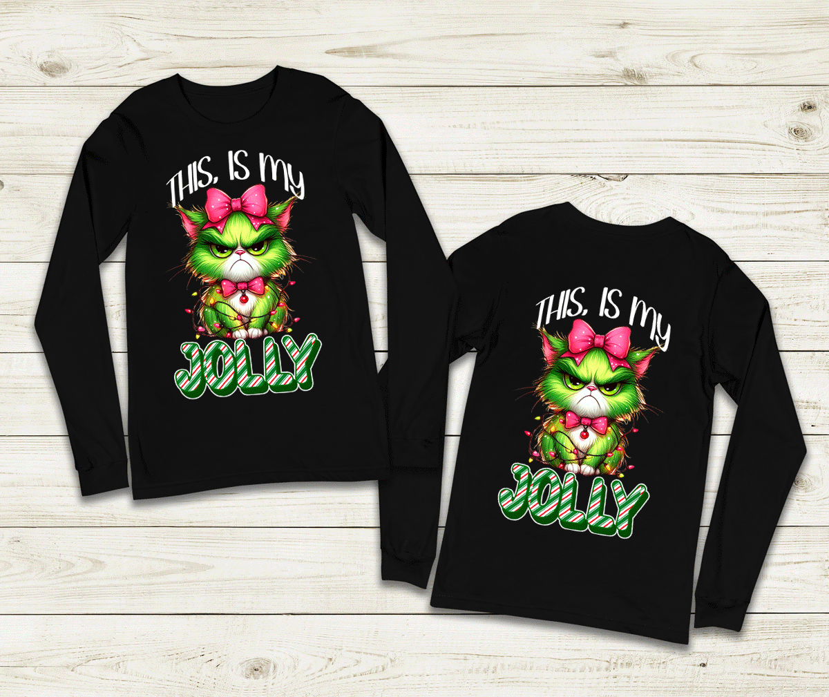 Black long-sleeve shirts with Grinch design and text on a wooden surface