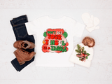 Holiday-themed items including a tee, jeans, boots, and a hat with tinsel text on a white background