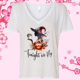 White V-neck t-shirt with Halloween-themed design featuring a witch, pumpkin, and flowers on a pink floral background.