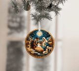 Decorative Christmas ornament depicting the nativity scene hanging on a tree branch.
