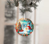 Decorative Christmas ornament with a snowman and festive scene on a tree branch.