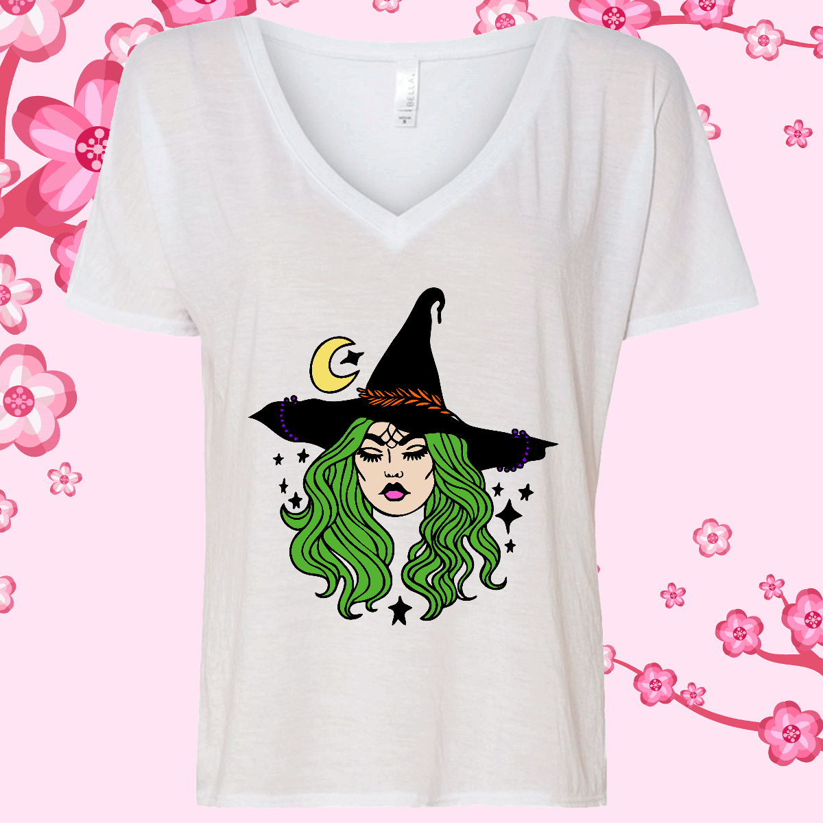 White V-neck t-shirt with a witch graphic on a pink floral background