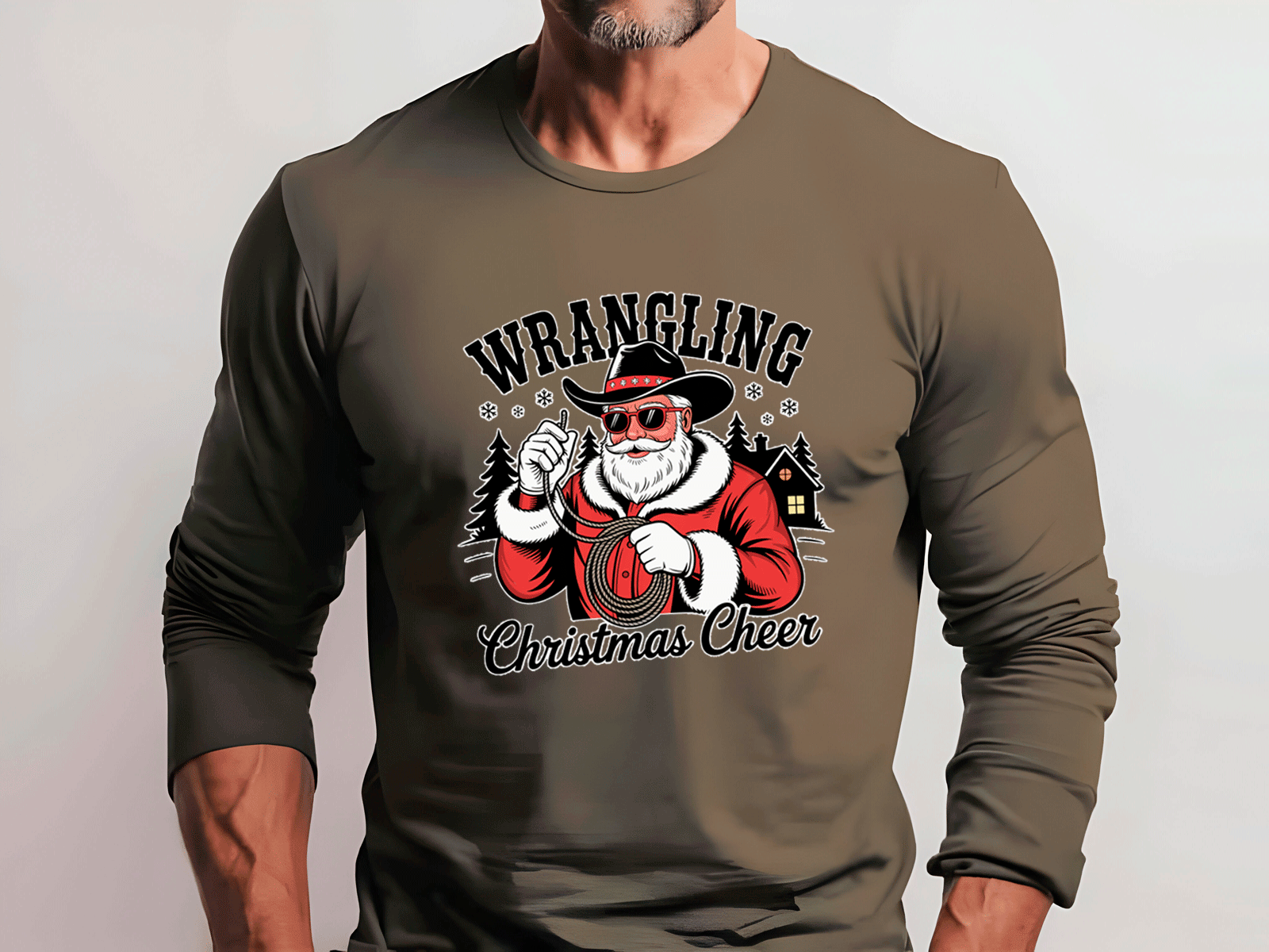 Brown long-sleeve shirt with a graphic of Santa Claus and text 'Wrangling Christmas Cheer' on a plain background.