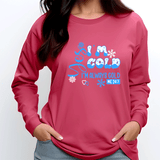 Person wearing a pink sweatshirt with blue text and graphics on a white background