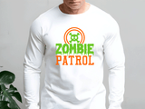 Person wearing a white long-sleeve shirt with 'Zombie Patrol' design.